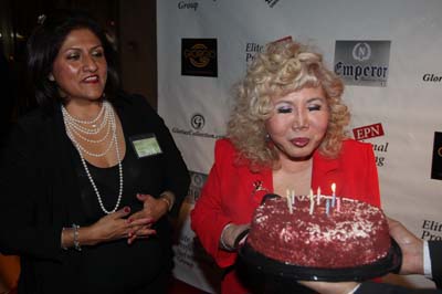 Gloria Cressler February celebrant with her birthday cake