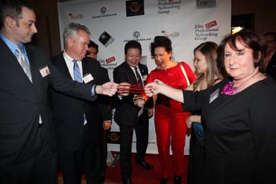 Professor Qei- Fei-Long showing his talent to Richard Alan, Michael S. Stryker, Jun Pasiculan, Professor Qi Fei- Long, Cristina Fontinelli Opera Singer and Nancy Duffy of Over 40 Women