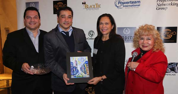   Elizabeth Stern receiving her door Prize