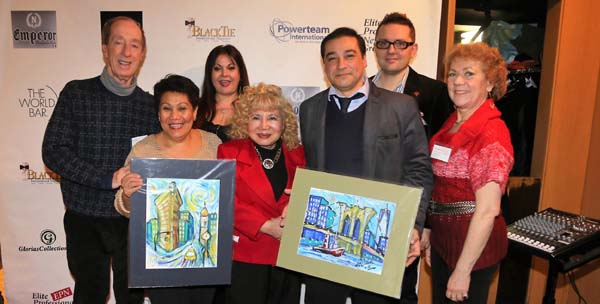  Celia concepcion receiving her paintings from artist Juan Fernando Silva