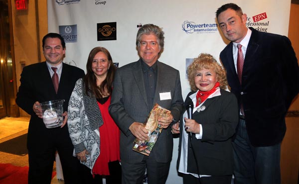  Celebrity Architect Stephen Valentines receiving her door prize from Susana Koehler