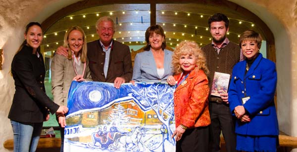 The Hauser Family recieving a painting from Juan Fernando Silva of the Stanglwirt Bio Hotel (The Wooden Castle & Green Spa Resort) Elisabeth Hauser, Maria Hauser -Lederer, Balthazar Hauser, Magdalena Hauser, Gloria T. Cressler International Editor Black Tie International Magazine & President & Founder Elite Professional Networking Group,  Johannes Hauser, International Singer Alicia Lundquist of Nashville/Brentwood TN and Elise Hill sorry she is not in the picture she is taking our pictures in which she is doing a good job.