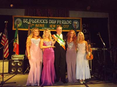 Celtic Woman (Chloë Agnew, Lisa Lambe, Lisa Kelly and Celtic violinist Máiréad Nesbitt) with Honoree Frank Comerford, Grand Marshal for the 2012 Parade and Chief Revenue Officer and President of Commercial Operations for NBC Owned Television Stations