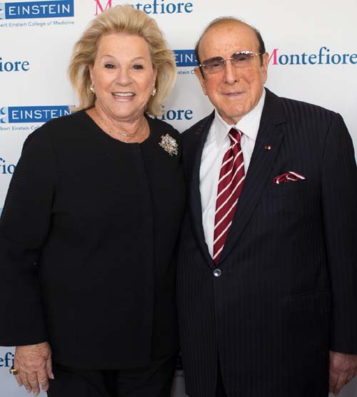 Womens Division President Carol Roaman with 2016 Spirit of Achievement Honoree Clive Davis