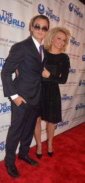 Pamela Anderson and son. Photo by: Rose Billings/Blacktiemagazine.com