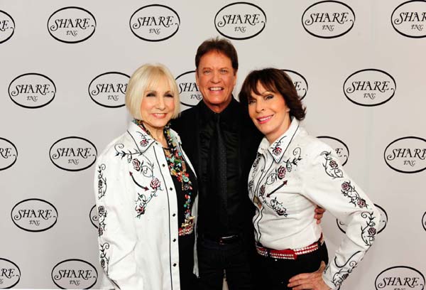 SHARE President Ellen Feder, emcee Rick Dees and SHARE Chairman of the Board September Sarno