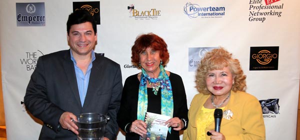     Krystyna Chmielewska receiving her door prize