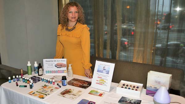 Irina Gubenko of Fragrant Wellness on her display table