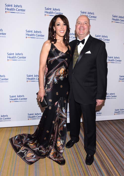 2016 Caritas Award honoree Jennifer Beals and her presenter Dr. John Robertson